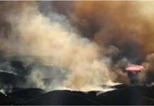Air tankers fight Los Angeles fires from frantic skies